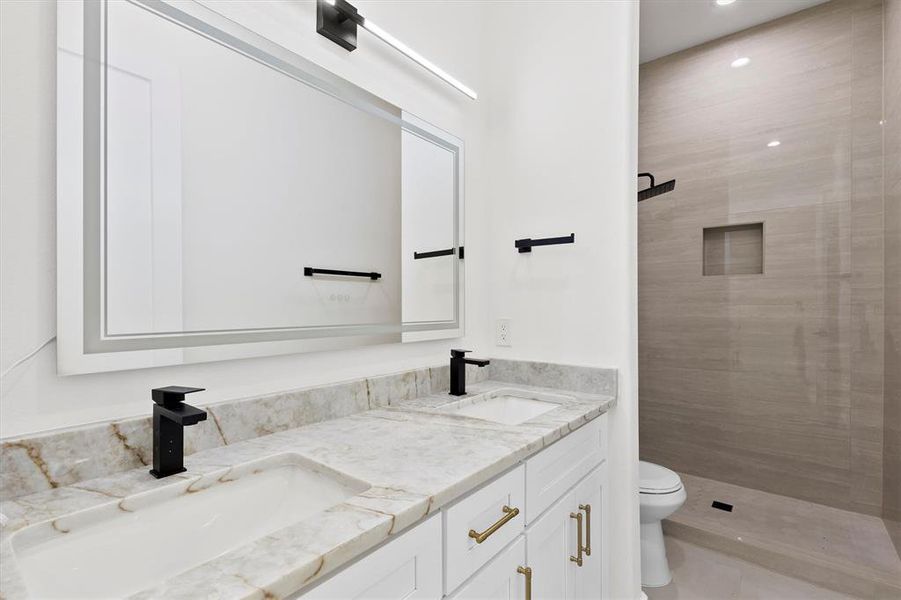 Double vanity in this upstairs hall bathroom