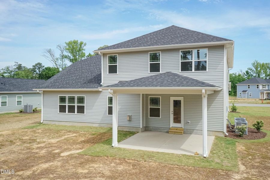 Exterior details and patio area of a home in Charlotte's Ridge, Middlesex (Image 4).