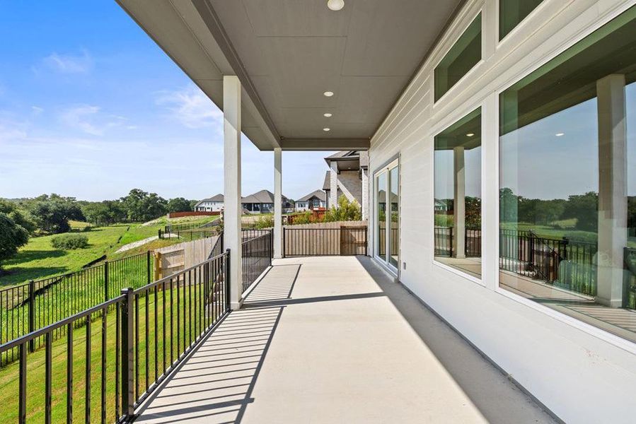 Exterior details and patio area of a home in Lariat, Liberty Hill (Image 27).