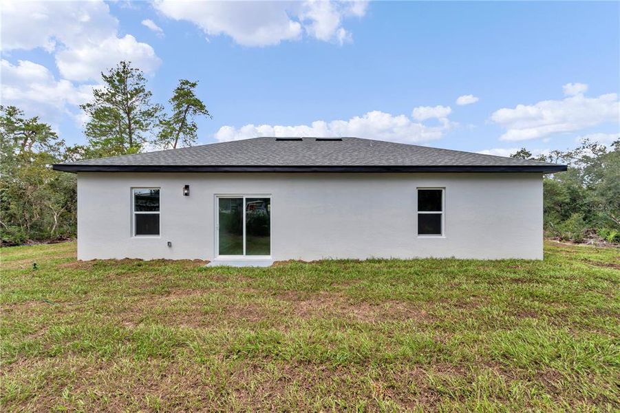 Exterior details and patio area of a home in , Ocala (Image 4).