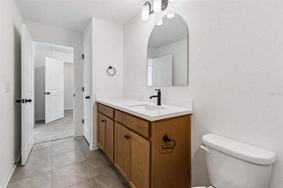 Furnished interior view inside a new home in Avalon West, Spring Hill (Image 40).