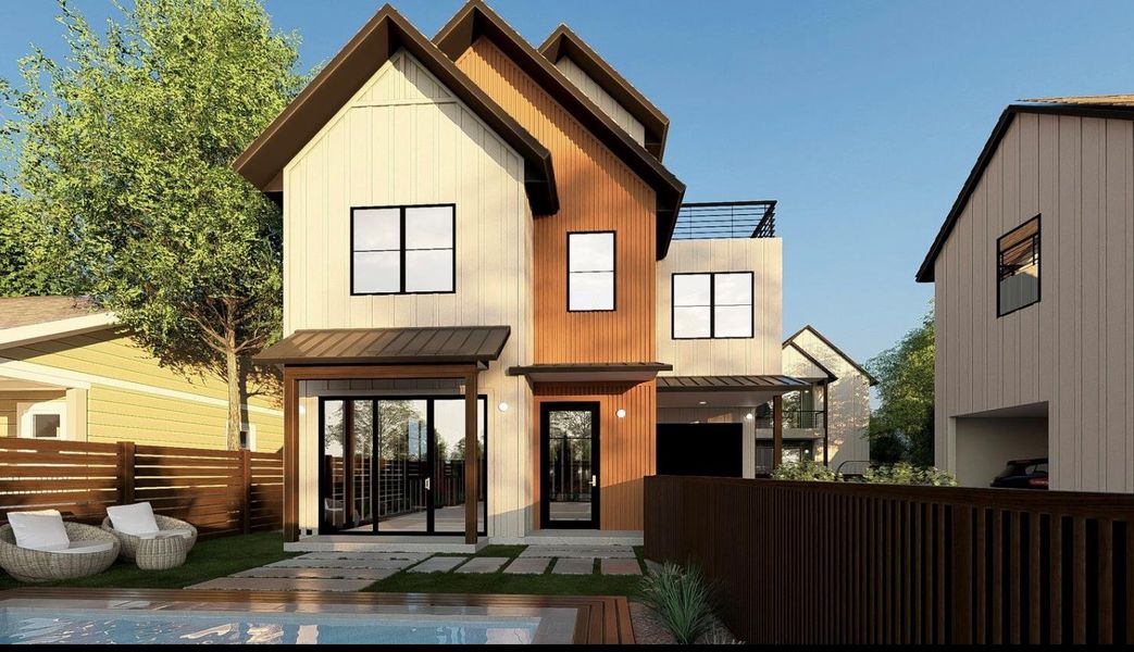 Rear view of house featuring a standing seam roof and a metal roof Rear view of house featuring a standing seam roof and a metal roof