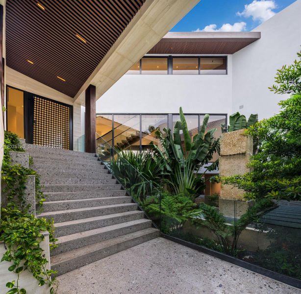 Exterior details and patio area of a home in , Coral Gables (Image 4). Exterior details and patio area of a home in , Coral Gables (Image 4).
