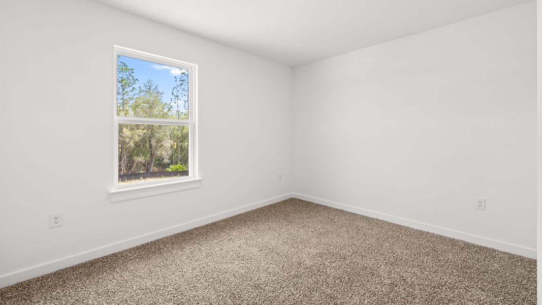Spacious, unfurnished interior of a new home in Magnolia at the Bluffs Phase 3, Freeport (Image 18).
