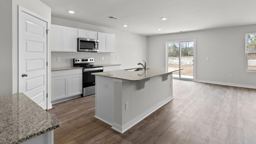 Furnished interior view inside a new home in Sidbury Station, Castle Hayne (Image 6).