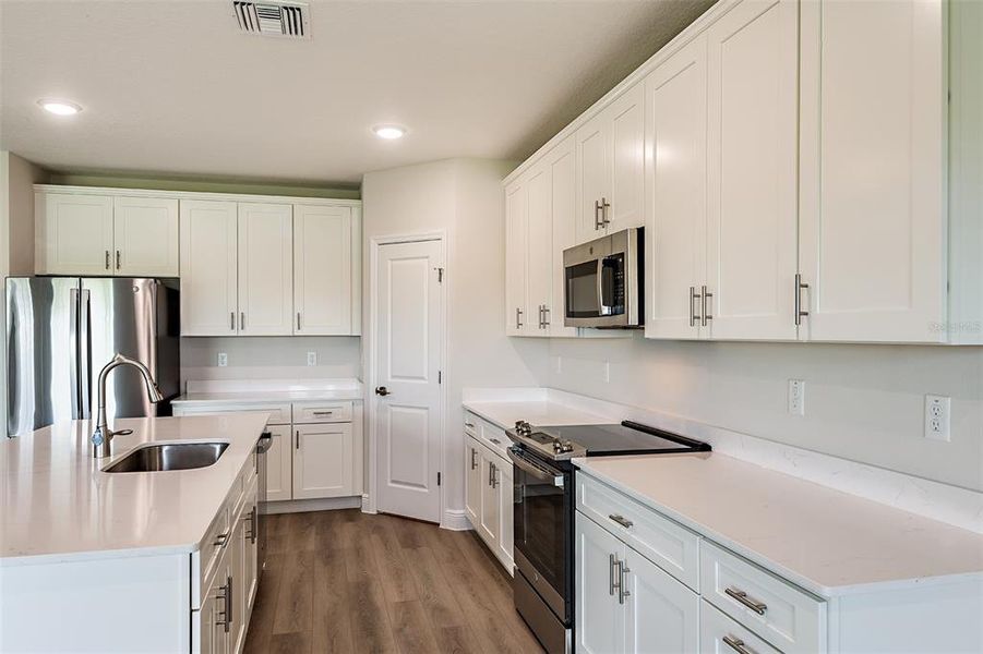 Furnished interior view inside a new home in Pasadena Landing, Wesley Chapel (Image 8). Furnished interior view inside a new home in Pasadena Landing, Wesley Chapel (Image 8).