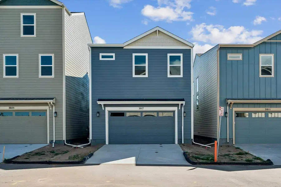 Front exterior of a new home in Pony Park, Colorado Springs, CO, highlighting curb appeal (Image 2).