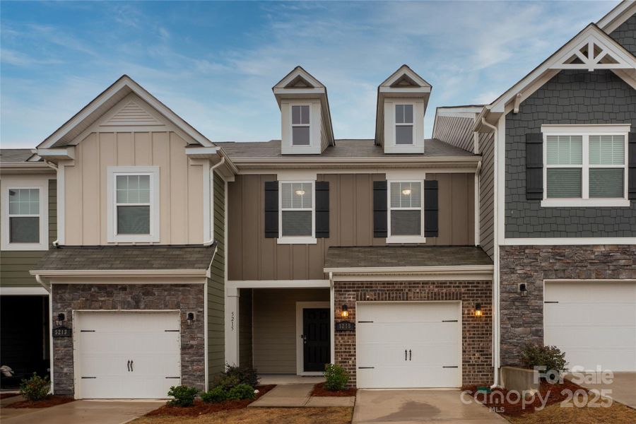 Front exterior of a new home in Secrest Landing, Monroe, NC, highlighting curb appeal (Image 26). Front exterior of a new home in Secrest Landing, Monroe, NC, highlighting curb appeal (Image 26).