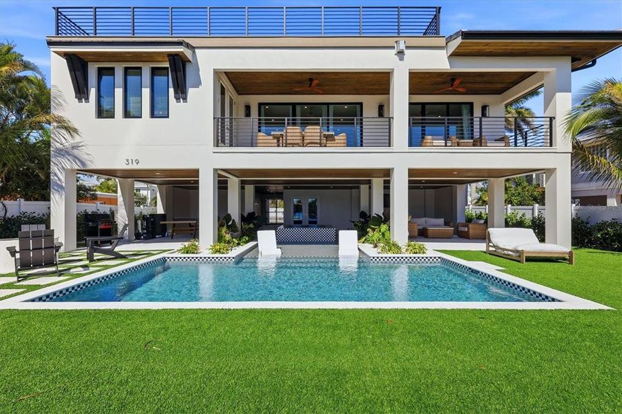 Exterior details and patio area of a home in , Anna Maria (Image 39).
