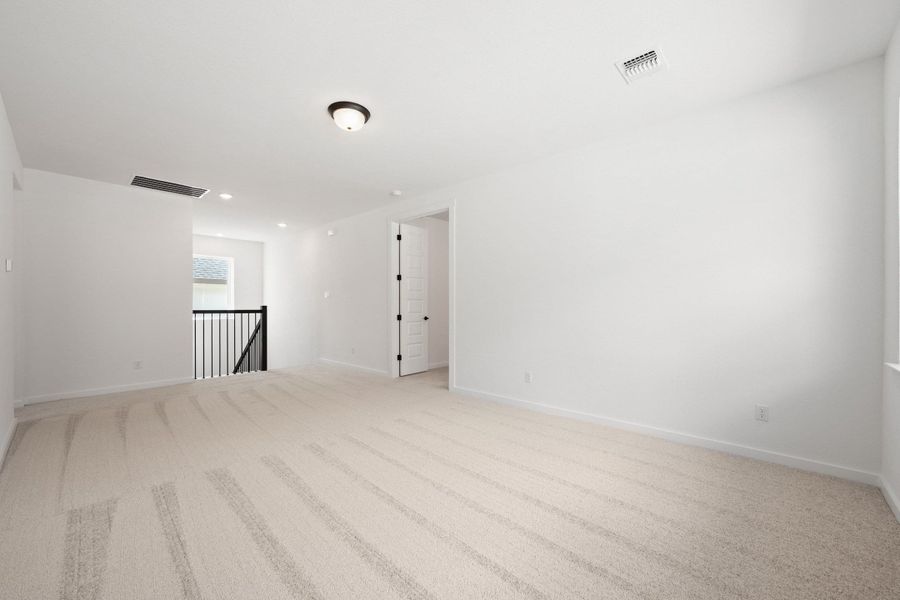 Spacious, unfurnished interior of a new home in Wolf Ranch, Georgetown (Image 42).