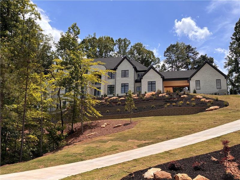Front exterior of a new home in , Alpharetta, GA, highlighting curb appeal (Image 13).