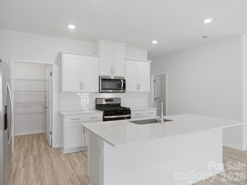 Furnished interior view inside a new home in Reedy Creek Preserve, Charlotte (Image 7).