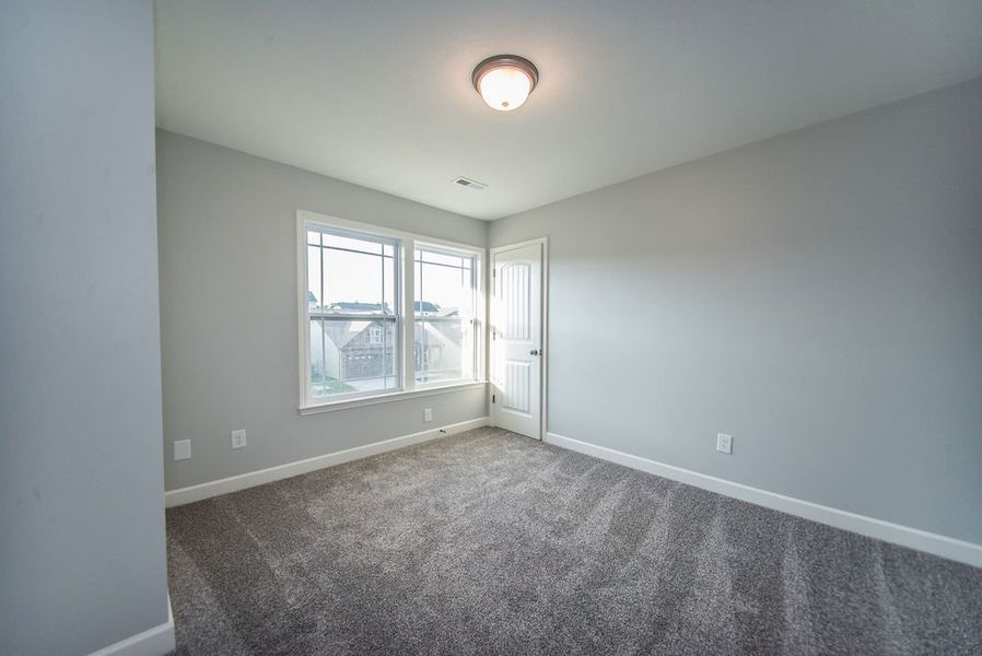 Representative unfurnished interior of a home built from the Heatherwood by Enchanted Homes in Arcadia Village, Spartanburg (Image 32).