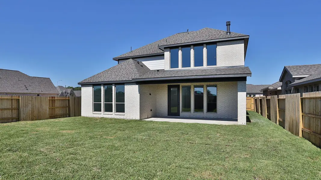 Exterior details and patio area of a home in Amira 50', Tomball (Image 3). Exterior details and patio area of a home in Amira 50', Tomball (Image 3).