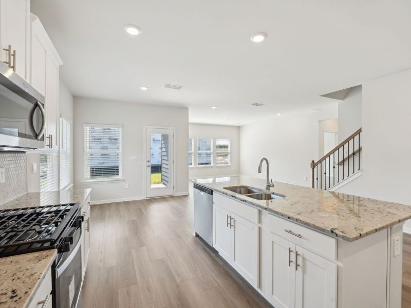 Furnished interior view inside a new home in Martin Springs - Estate Series, Lawrenceville (Image 8).