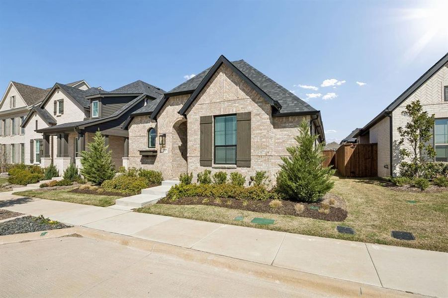Front exterior of a new home in , Celina, TX, highlighting curb appeal (Image 20).