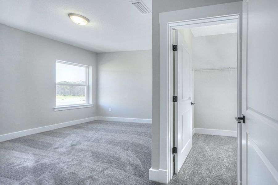Representative unfurnished interior of a home built from the Julington by Riverside Homes in Hidden Creek at SilverLeaf 70' Series, St. Augustine (Image 33).