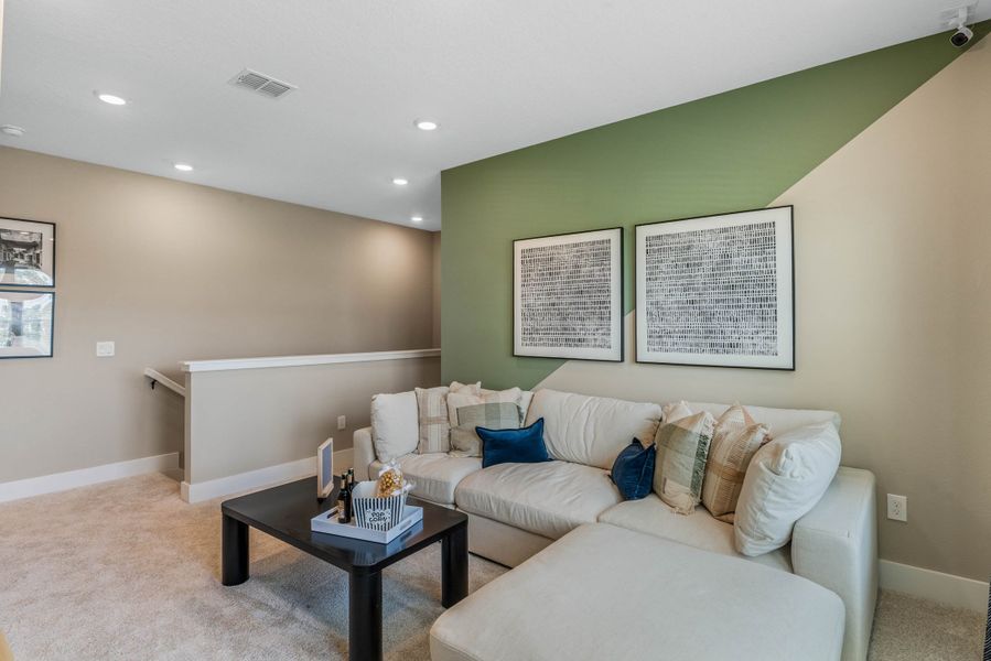 Furnished interior view inside a new home in Harvest at Ovation - Townhomes, Winter Garden (Image 31).