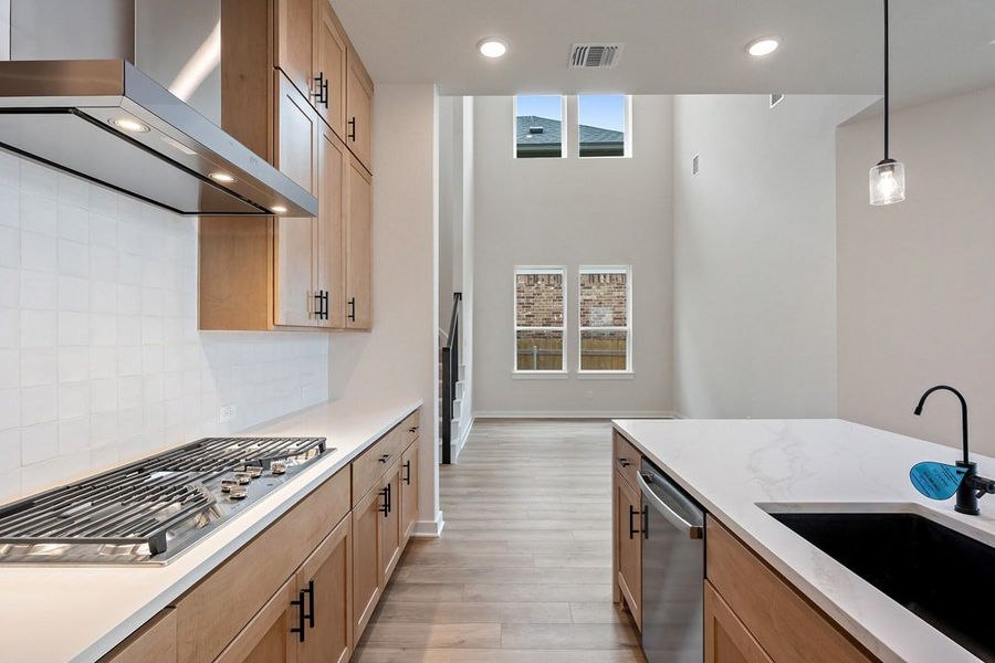 Furnished interior view inside a new home in Heritage, Dripping Springs (Image 10).