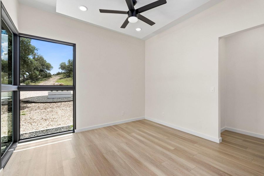 Unfurnished room featuring ceiling fan, recessed lighting, and light wood-type flooring