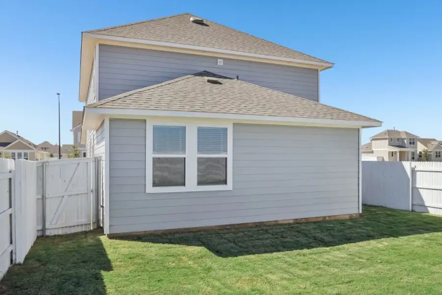 Exterior details and patio area of a home in Harvest Ridge, Elgin (Image 4).