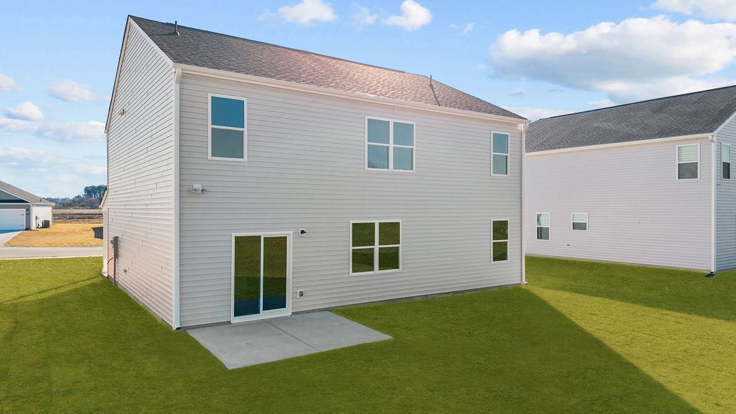 Exterior details and patio area of a home in West New Bern, New Bern (Image 18).