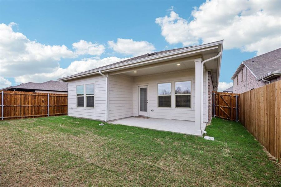 Exterior details and patio area of a home in Parks at Foster Crossing - Spring Series, Anna (Image 4).