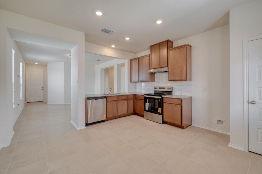 Furnished interior view inside a new home in Sonterra - Cool Water, Jarrell (Image 9).