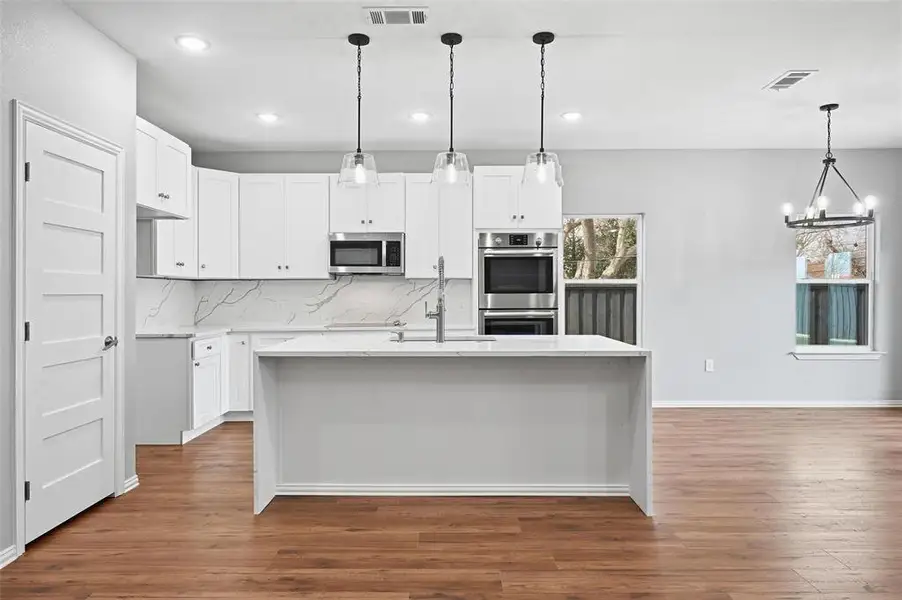 Furnished interior view inside a new home in , Farmers Branch (Image 7).