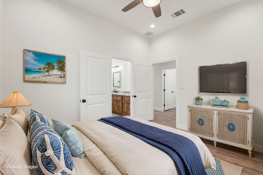 Bedroom with visible vents, recessed lighting, wood plank tile floor, and baseboards Bedroom with visible vents, recessed lighting, wood plank tile floor, and baseboards