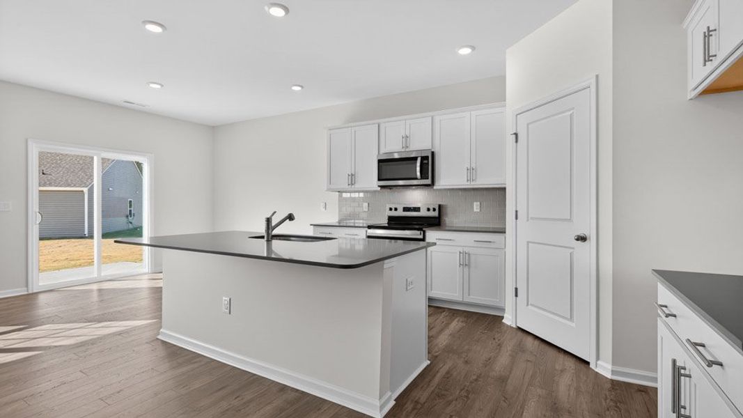 Furnished interior view inside a new home in North Gate, Vass (Image 5).