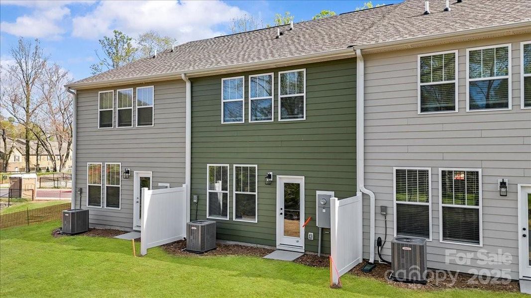 Front exterior of a new home in Clayton Crossing, Arden, NC, highlighting curb appeal (Image 18). Front exterior of a new home in Clayton Crossing, Arden, NC, highlighting curb appeal (Image 18).