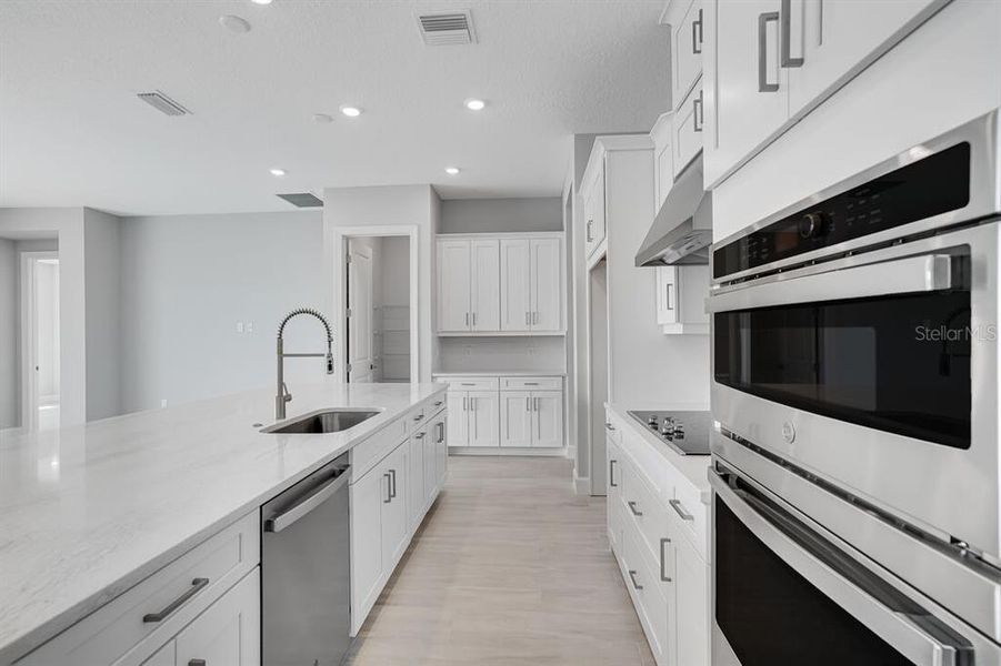 Furnished interior view inside a new home in Esplanade at Westview, Kissimmee (Image 8).
