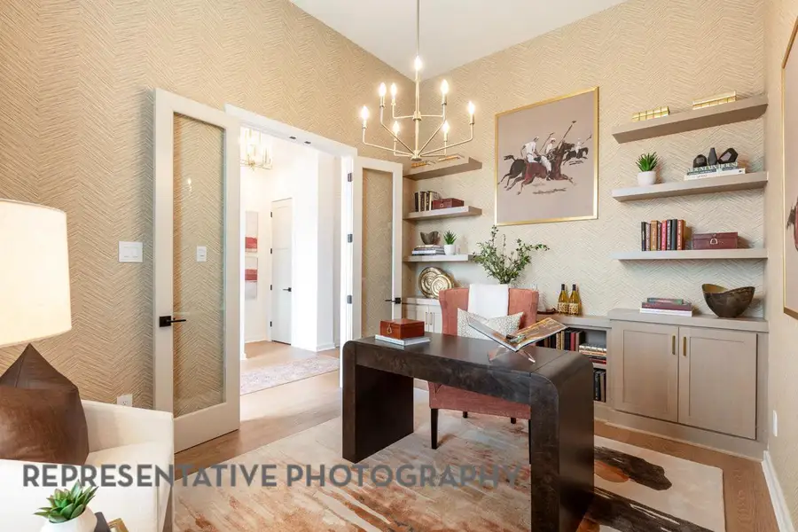 Office with an inviting chandelier, baseboards, wallpapered walls, and light wood-style flooring