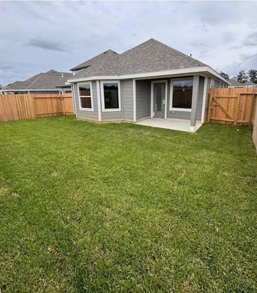 Exterior details and patio area of a home in Townsend Reserve, Splendora (Image 3).