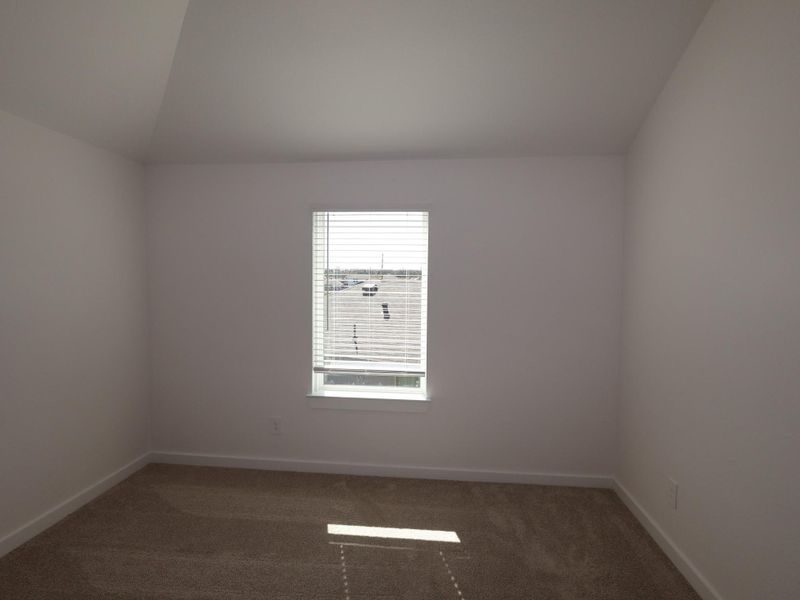 Spacious, unfurnished interior of a new home in Pinewood at Grand Texas, New Caney (Image 14).