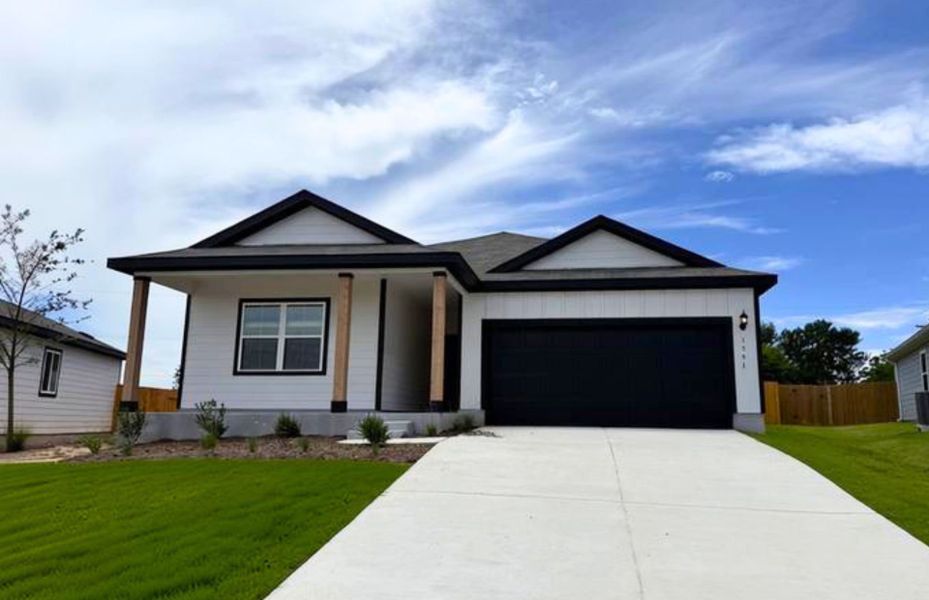 Front exterior of a new home in Skyview, Belton, TX, highlighting curb appeal (Image 2). Front exterior of a new home in Skyview, Belton, TX, highlighting curb appeal (Image 2).
