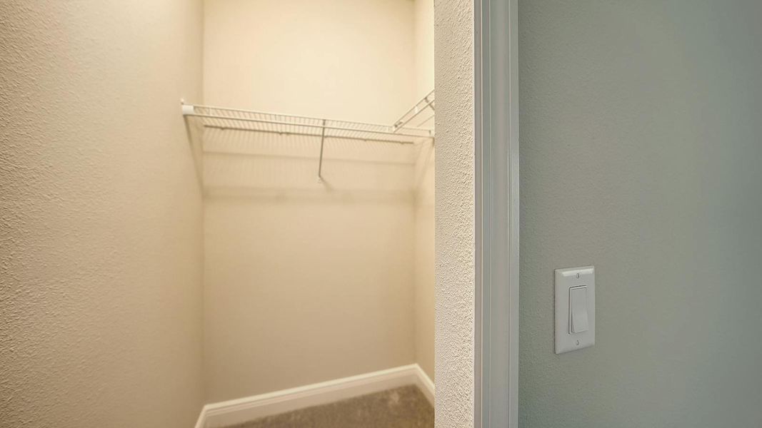 Spacious, unfurnished interior of a new home in Wildleaf Real Estate and Homes for Sale in Parrish, FL - Neal Communities, Parrish (Image 34).