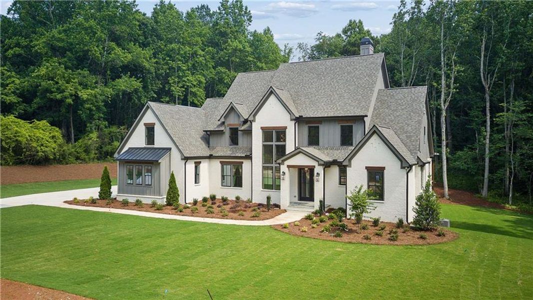 Front exterior of a new home in , Canton, GA, highlighting curb appeal (Image 25). Front exterior of a new home in , Canton, GA, highlighting curb appeal (Image 25).