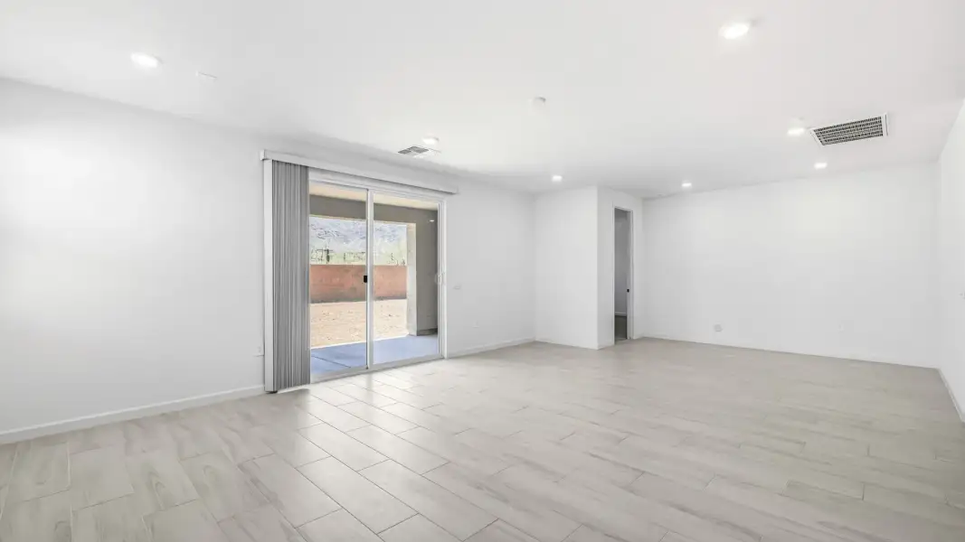 Representative unfurnished interior of a home built from the Tapatio by D.R. Horton in El Cidro, Goodyear (Image 20). Representative unfurnished interior of a home built from the Tapatio by D.R. Horton in El Cidro, Goodyear (Image 20).