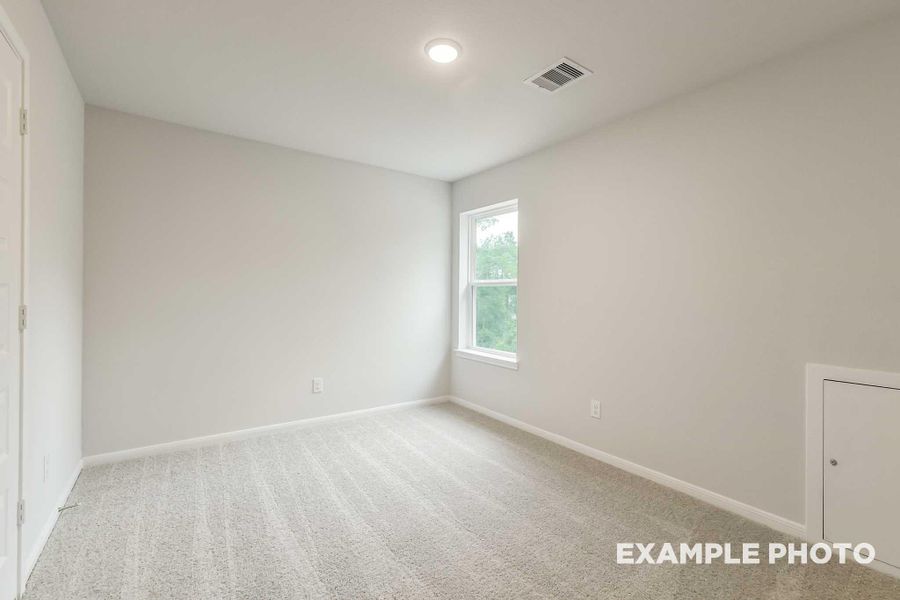 Spacious, unfurnished interior of a new home in Caney Creek Place, Conroe (Image 24).