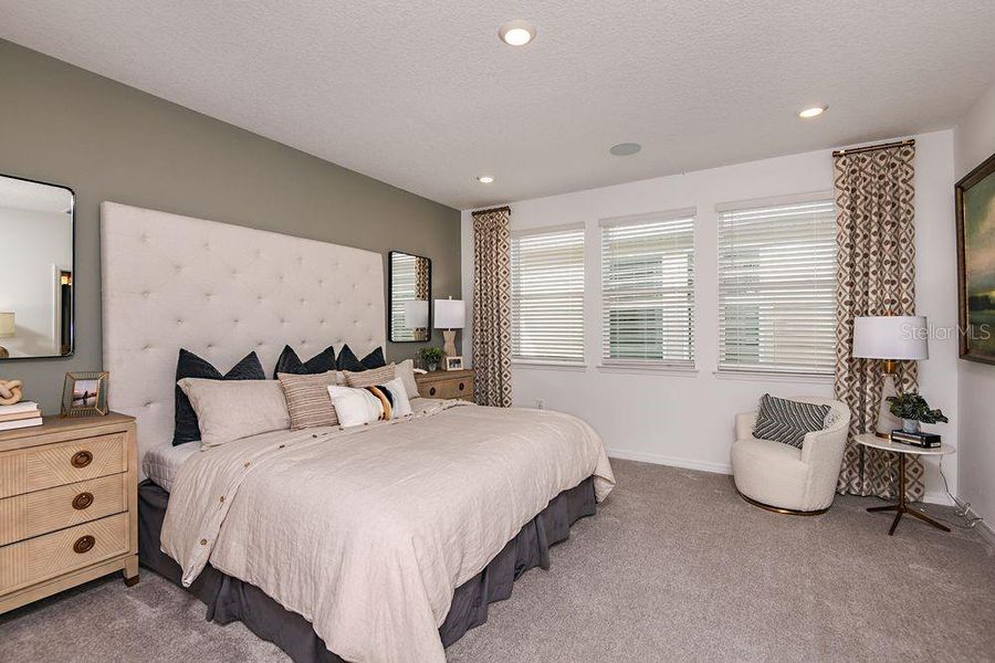 Furnished interior view inside a new home in Harvest at Ovation, Winter Garden (Image 6).