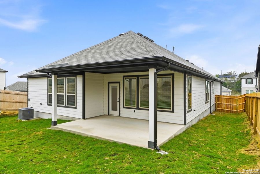 Exterior details and patio area of a home in Vista Ridge, Live Oak (Image 2).