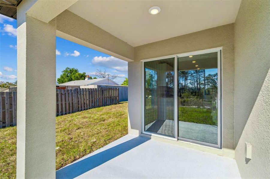 Exterior details and patio area of a home in , Spring Hill (Image 4).