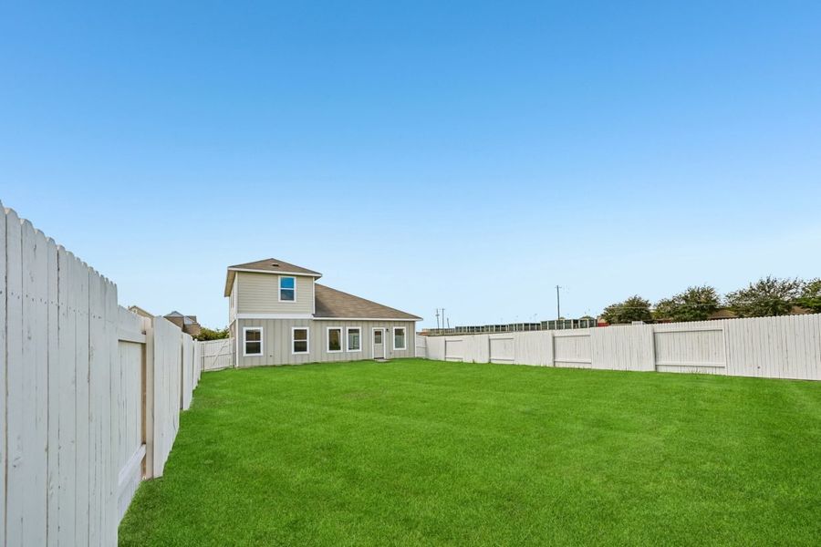 Exterior details and patio area of a home in Casetta Ranch, Kyle (Image 4).