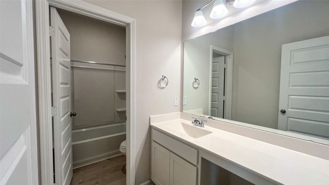 The Sparrow II- Hall Bath 2. Sample floor plan image for illustration; upgrades, options, and colors may vary.