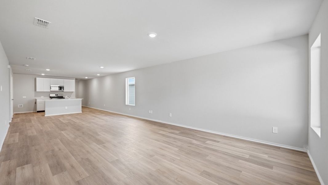 Representative unfurnished interior of a home built from the Estero by D.R. Horton in Hickory Grove, Krum (Image 22).
