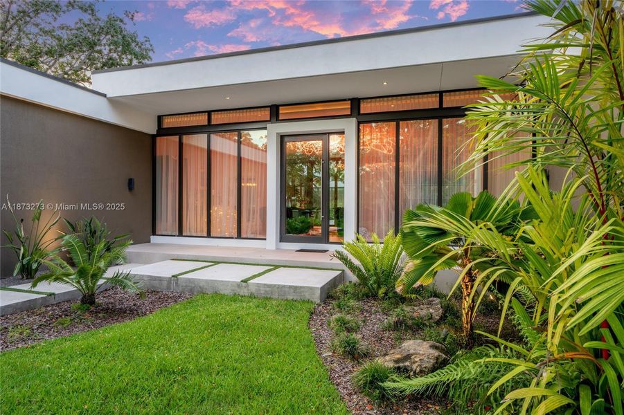 Front exterior of a new home in , Pinecrest, FL, highlighting curb appeal (Image 21).