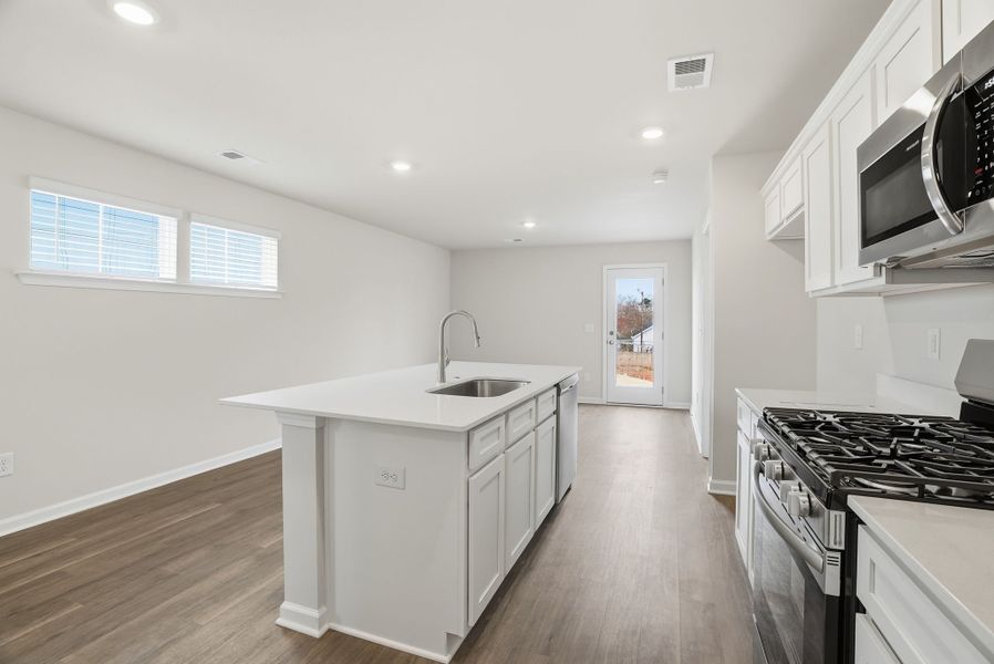 Representative furnished interior of a home built from the Juniper B by McGuinn Homes in Hunters Branch, Hopkins (Image 18).