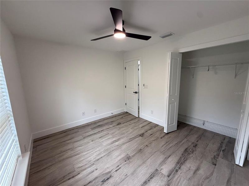 Spacious, unfurnished interior of a new home in , Port Charlotte (Image 30).